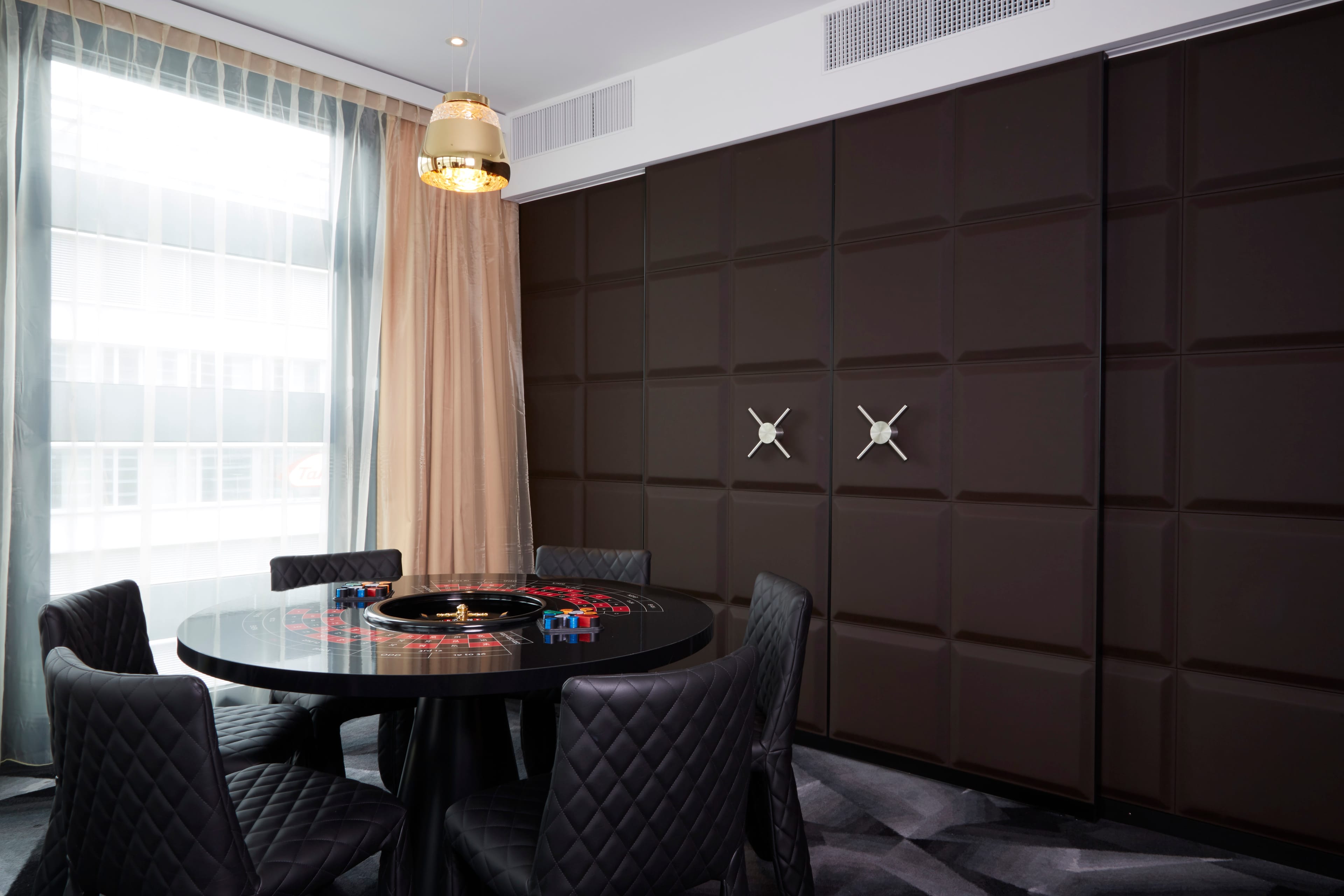 Interior of Kameha Grand with Monster Dining Chair and Valentine Baby suspension light